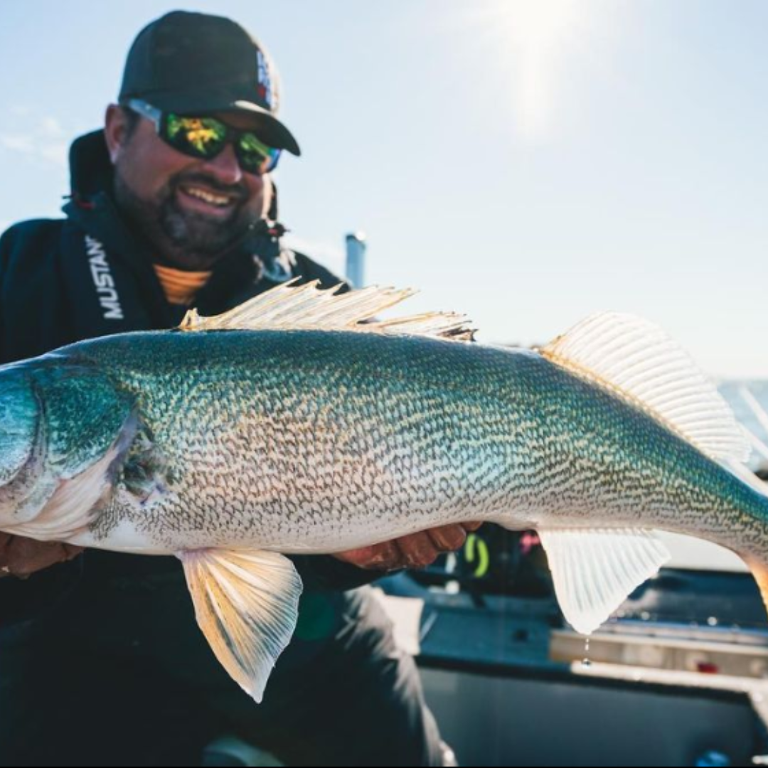 https://www.acmetackle.com/cdn/shop/articles/Clayton_Schick_Outdoors_The_Angler_s_Haven_-_Ice_Fishing_Walleye_2_1080x.png?v=1704825264